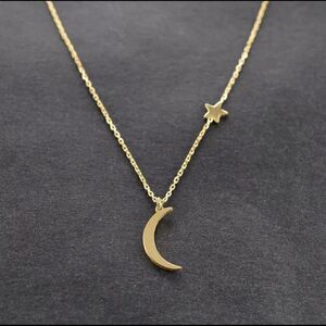 Gold Tone Moon and Star Necklace